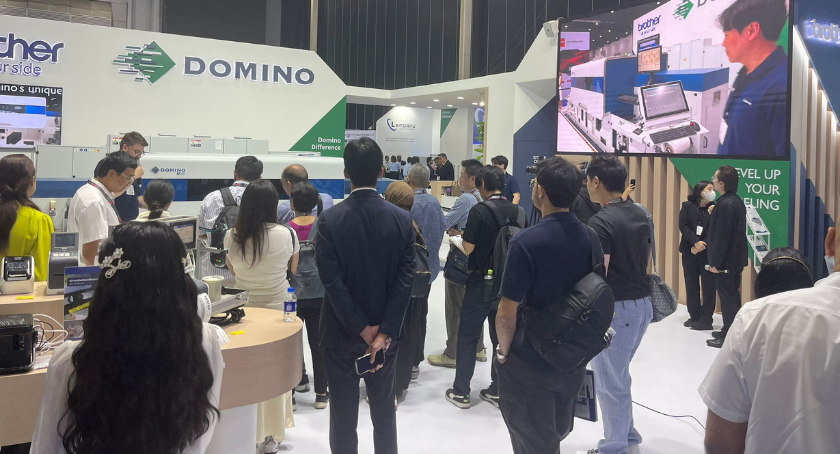 The Domino booth received a crowd on the opening day of the event.